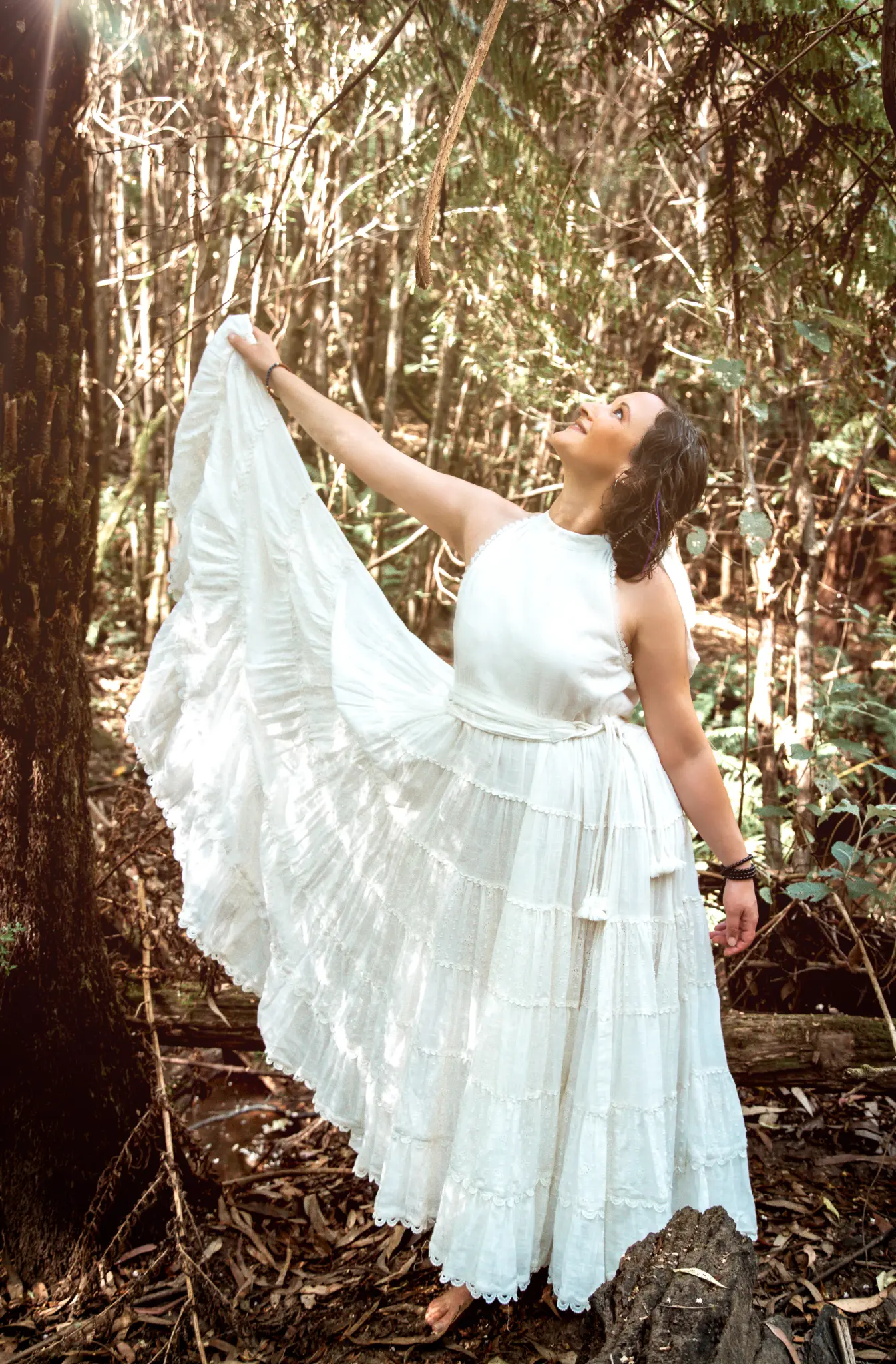 Elle in the Kinglake forest in a flowing white dress