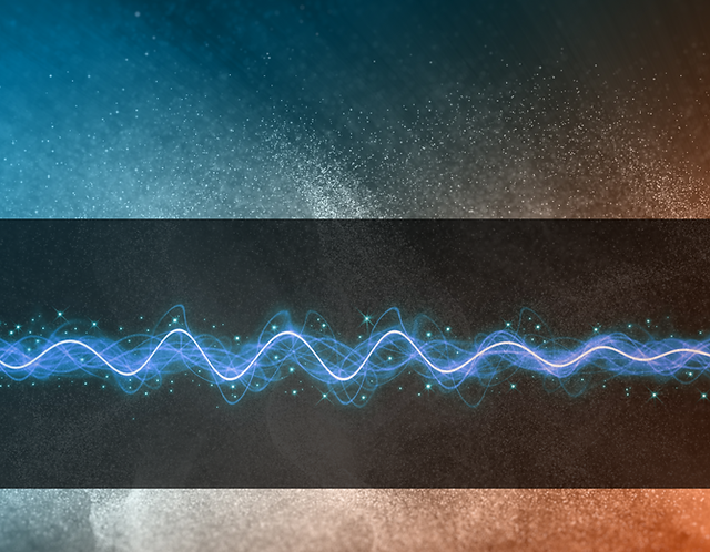 Terahertz frequency wave pattern in blue on dark background